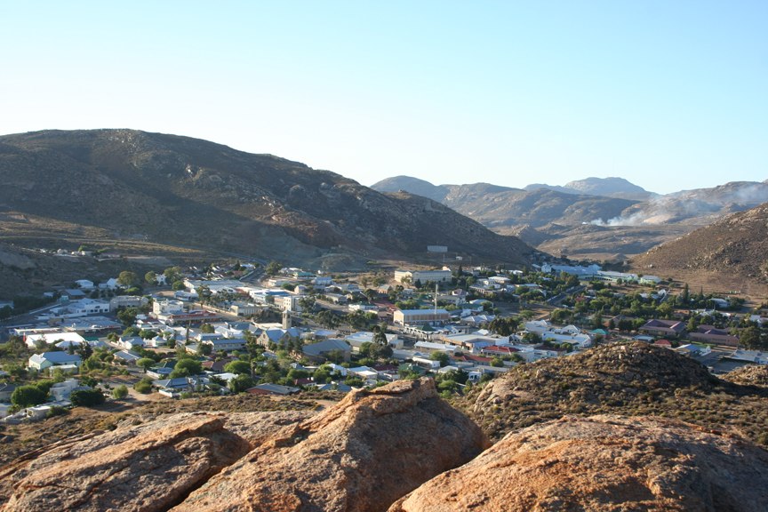 Springbok town center with the rest of the town extending in a cresent shap in both directions around the hill that the picture was taken from.